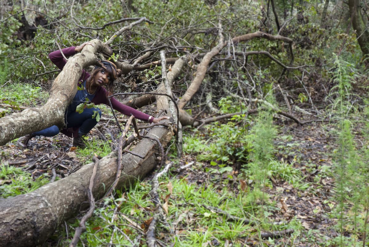 Lakeia Hodges crawling through brush on Johns Island after Hurricane Joaquin in 2015.