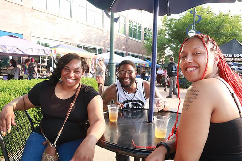 L to r: Angie Patterson with her son Andre, and his girlfriend Tay Rush at the Pride Party at Bass Street Landing June 17, 2023.