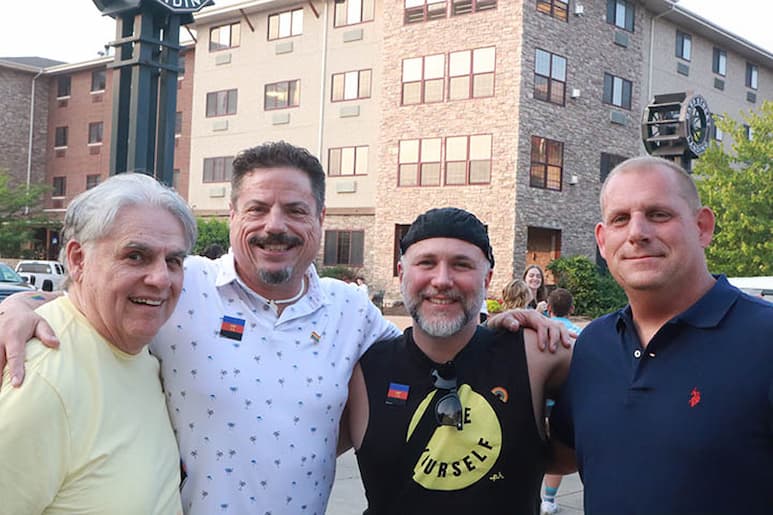 Mike Lopez, James Perez, Jim Lynch-Perez, and Jake Bazor at the Pride Party at Bass Street Landing June 17, 2023.