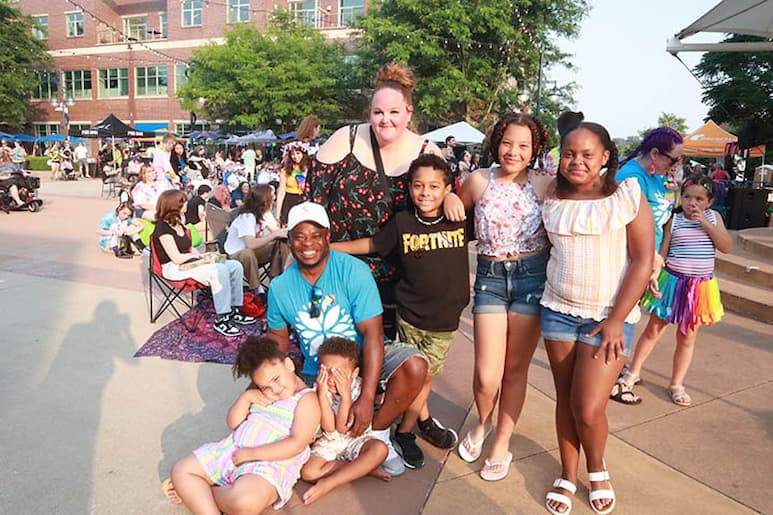 Adel Olapade and Samantha Norris with their children Kyle, Igha, Myles, Paris and Legend at the Pride Party of Bass Street Landing in Moline June 17, 2023.
