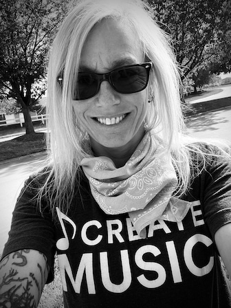 Niki Lunden Trotter of Natural Habits Band wearing shirt that reads Create Music