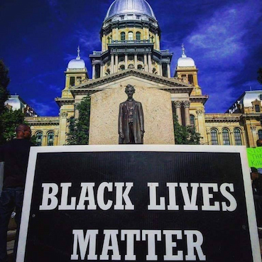 Black Lives Matter sign with Abraham Lincoln statue