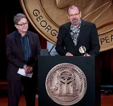 Joy Tomchin and David France receiving Peabody Award for How to Survive a Plague