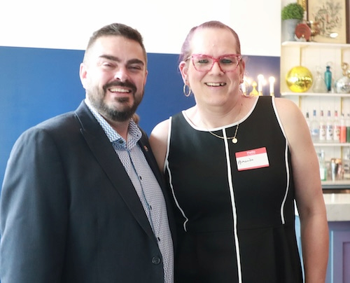 Chad Johnston, secretary of the Iowa LGBTQ Chamber of Commerce, and Amanda Littrel of Moline, at the on at the Davenport launch