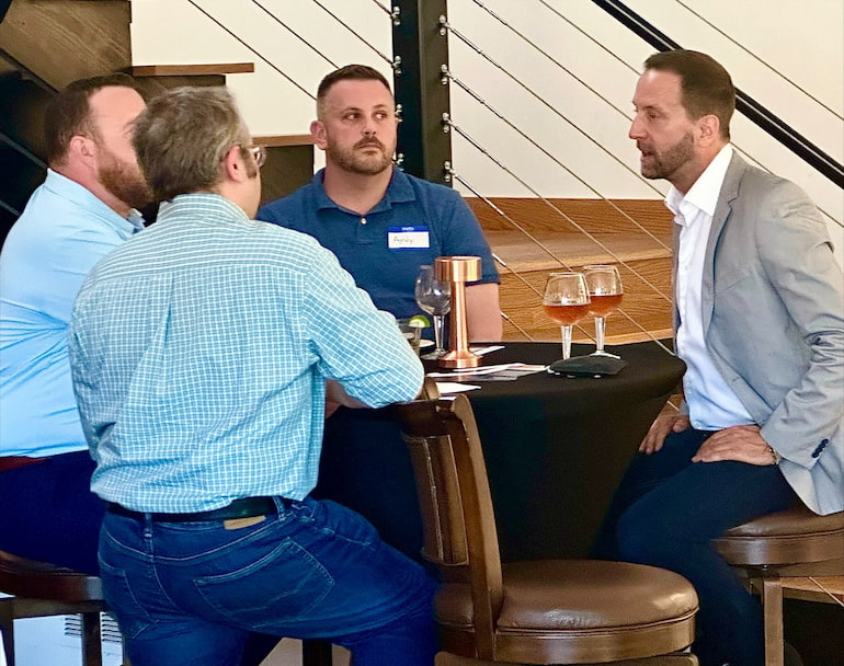 Egan Wilgenbusch, Chuck Harris, Andy McLees, and Dan Jansen at the Dubuque launch event.