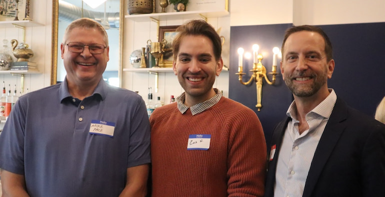 Mike Pace, of the Mindy Smith Pace campaign; Zachery Nielsen of Bloom Therapy; and Dan Jensen of the Iowa LGBTQ Chamber of Commerce at the Davenport launch