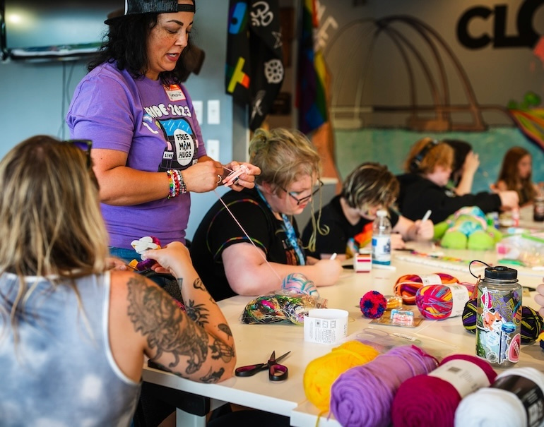 Natasha Hoenig of Free Mom Hugs leading Craft Night at Clock Inc. LGBT+ Community Center in Rock Island