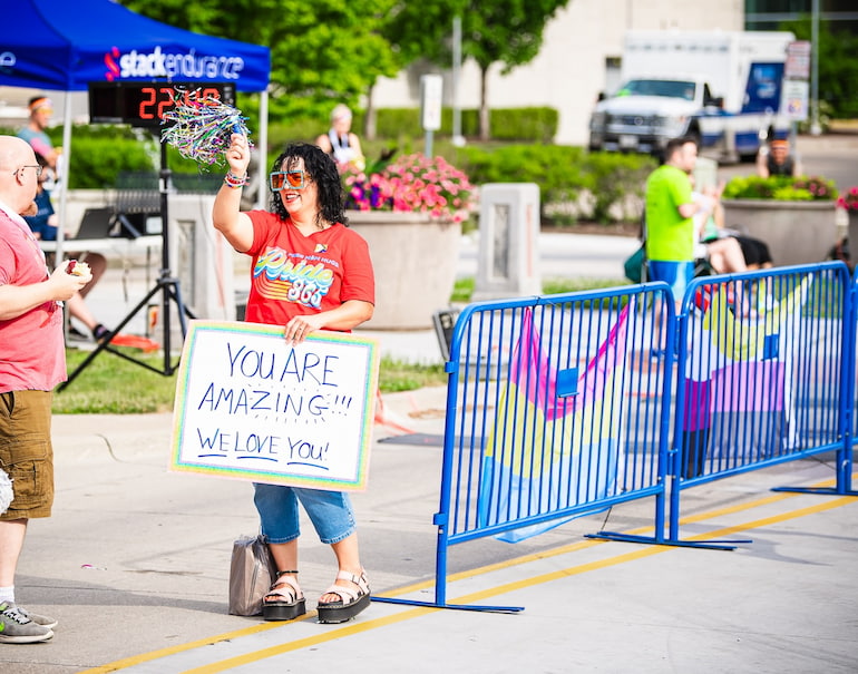 Natasha Hoenig of Free Mom Hugs cheers on runners at the Pride 5K June 15