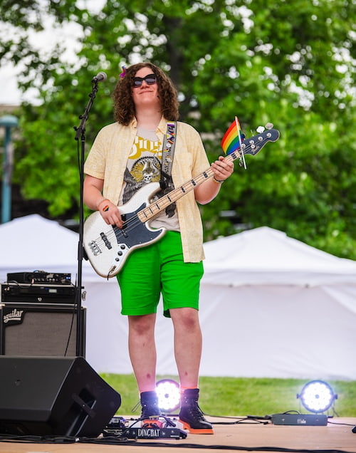 Band member from QC Rock Academy at Pride Party at Bass Street Landing June 15