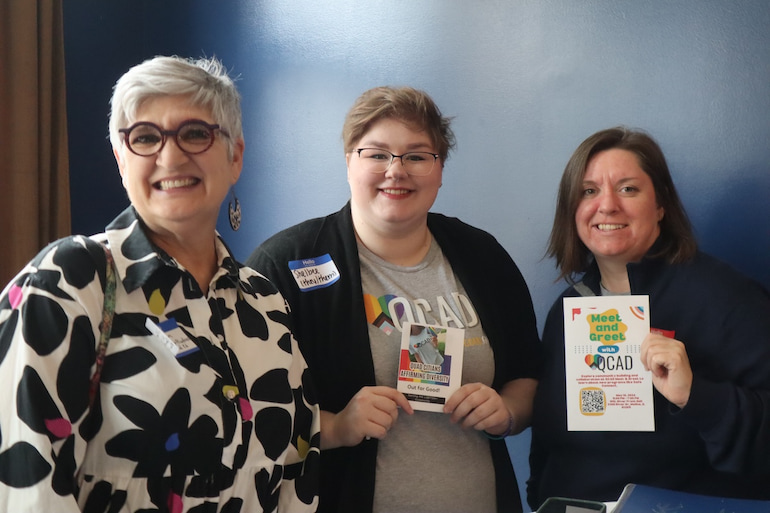 Steph Jordan of the Center for Best Practices Early Childhood Education, and Shelbee Bradley and Stephanie Patrick touting the Quad Cities Out for Good SafeConnect program, at the Davenport launch